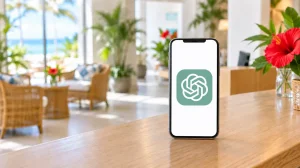 沖縄の小さなホテルのロビー。フロントカウンターに立てたスマートフォンの画面にChatGPTのアイコンが表示され、AIが電話に応対するイメージ