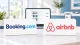 ホテルのフロントに置かれたBooking.comとAirbnbのロゴ看板。OTAのランキング要因を比較するイメージ